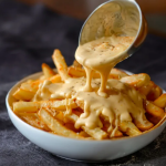 Frites sauce fromagère (+ 0.50 €)
